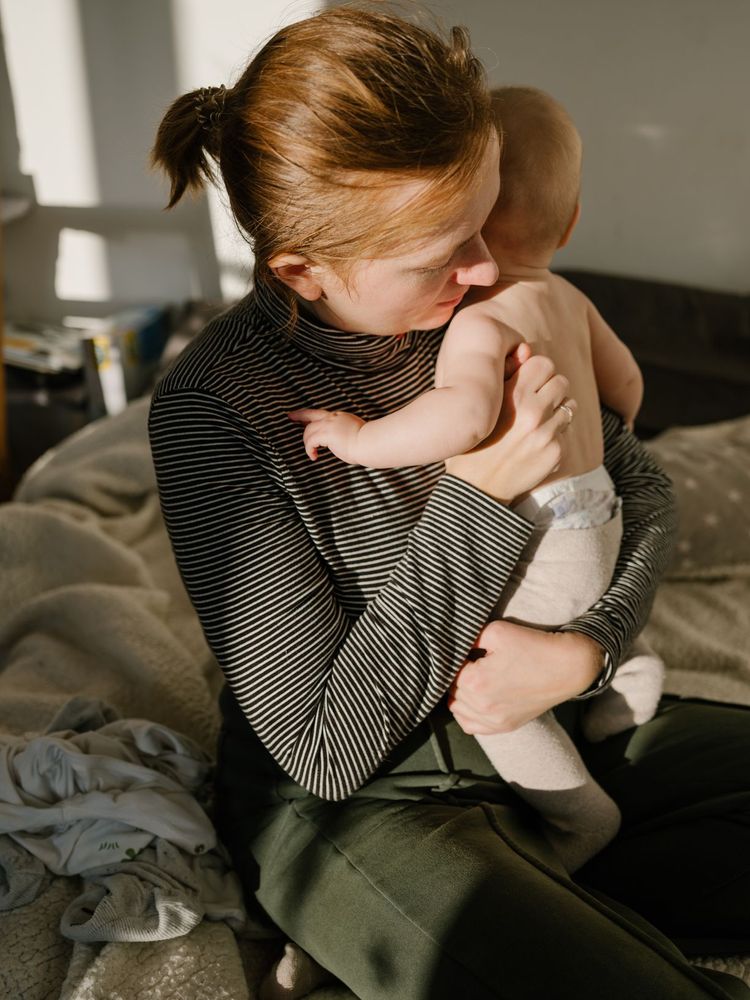 mother holding child